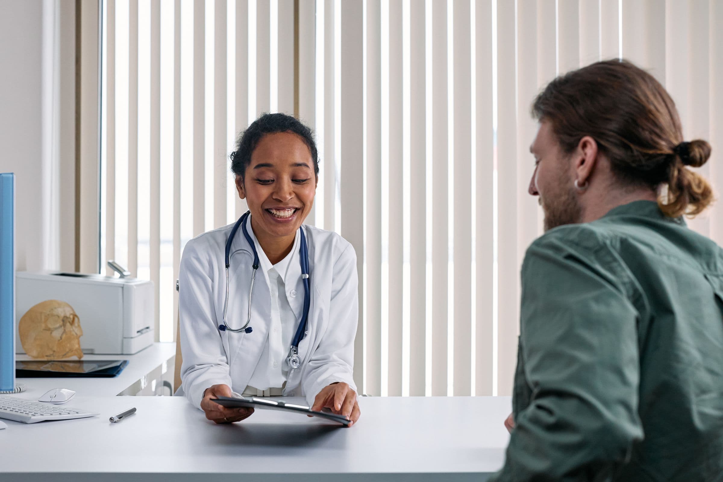 A clinician and patient in conversation